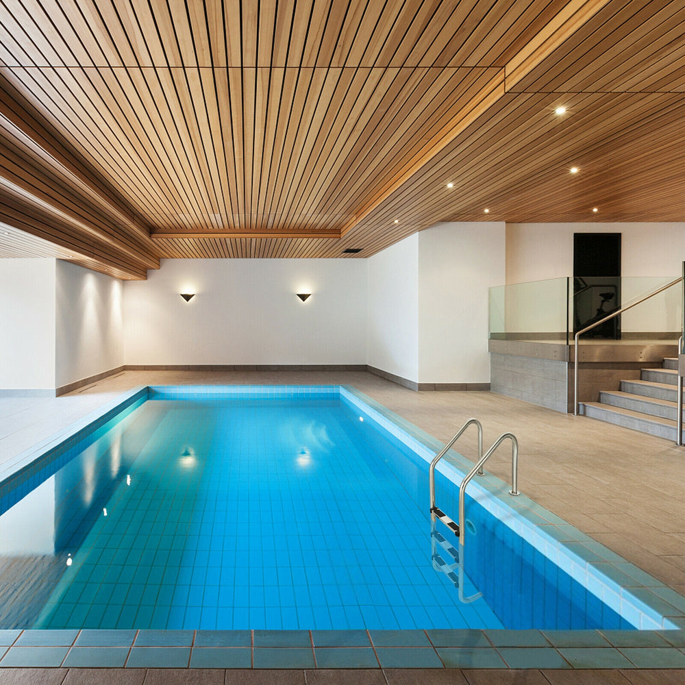 3-step stainless steel swimming pool ladder with anti-slip steps, designed for safety and stability in indoor pools.