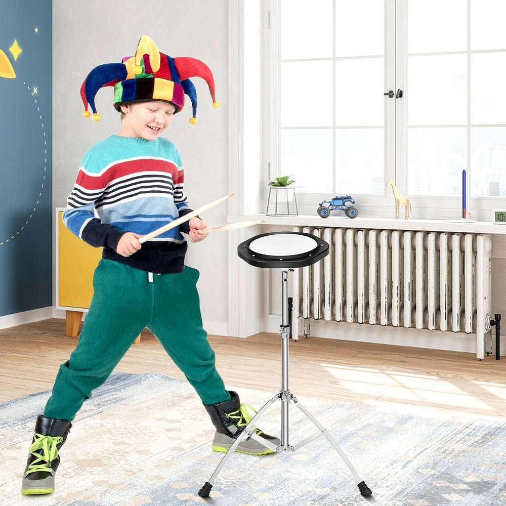 Child playing the 32 note glockenspiel xylophone with adjustable stand, showcasing a fun indoor music experience.