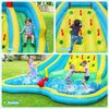 Kids enjoying the Inflatable Water Park Bounce House with double slide, climbing wall, and splash pool for summer fun.