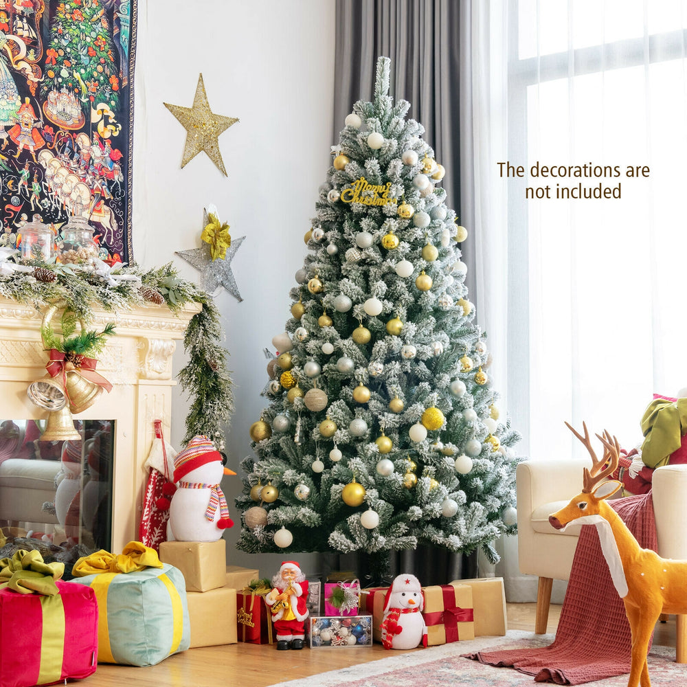 6-foot pre-lit snow flocked Christmas tree with 928 tips and metal stand, perfect for festive holiday decor.