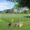 Large walk-in chicken coop with galvanized steel frame and PVC coated mesh, providing a secure outdoor space for.