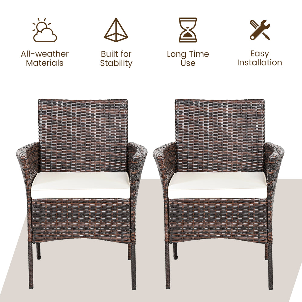 Two outdoor PE rattan armchairs with removable waterproof cushions, featuring curved armrests and a sturdy steel frame.