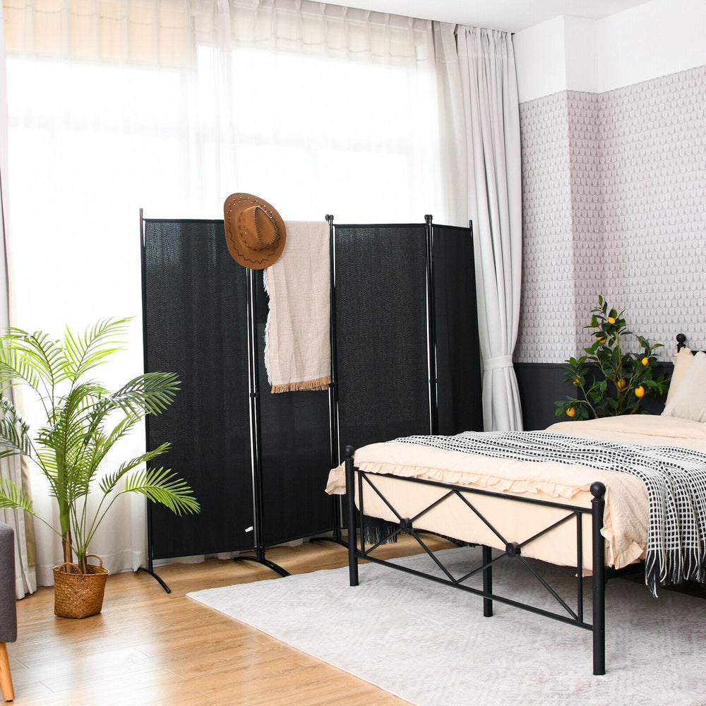 Four-panel black room divider with a sturdy steel frame, ideal for creating privacy in living rooms or patios.