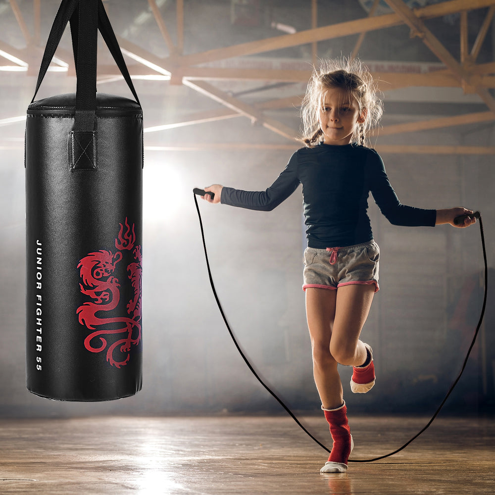 Kids boxing set featuring a punch bag, gloves, and skipping rope for children's workouts and fitness training.