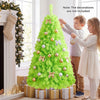 Lime green pre-lit Christmas tree with warm white LED lights, featuring 1338 branch tips for a vibrant holiday display.