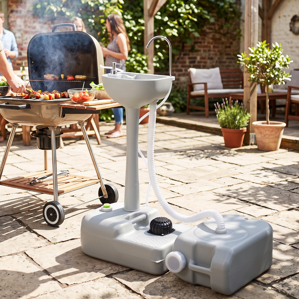 Portable 4.5-gallon wash basin stand with stainless steel faucet and 6.34-gallon recovery tank, ideal for outdoor cooking.