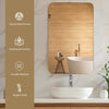 32-inch wall-mounted rectangular mirror with a golden metal frame, perfect for bathrooms and versatile home decor.