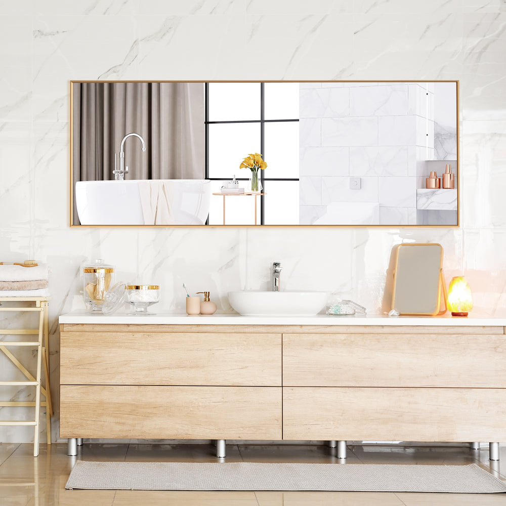 Large rectangle mirror with golden aluminum frame, perfect for bedroom decor, can be hung or leaned against the wall.