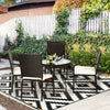 Single stackable patio dining chair with removable cushion cover, crafted from durable weather-resistant PE rattan.