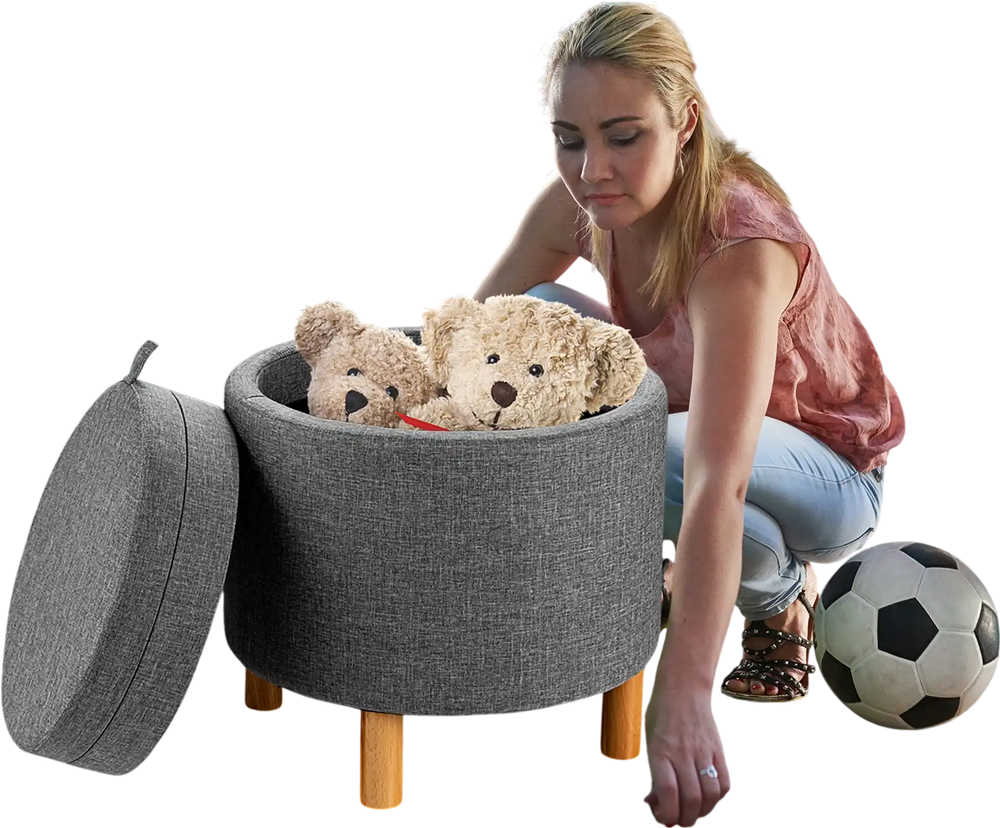 Round gray fabric storage ottoman with removable lid, wooden tray, and non-slip pads, ideal for bedroom organization.