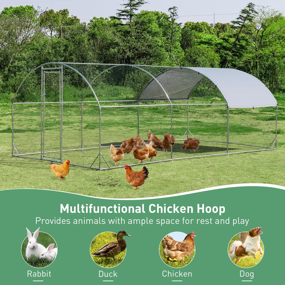 Large metal chicken coop with galvanized steel frame, waterproof cover, and ample space for chickens, rabbits, and.