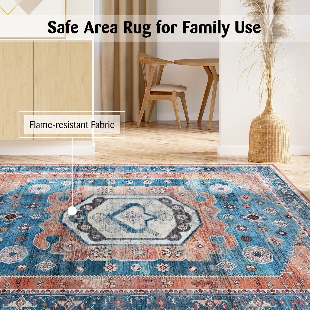Distressed vintage 5 x 7 inch area rug with flame-resistant fabric, perfect for living room or bedroom use.