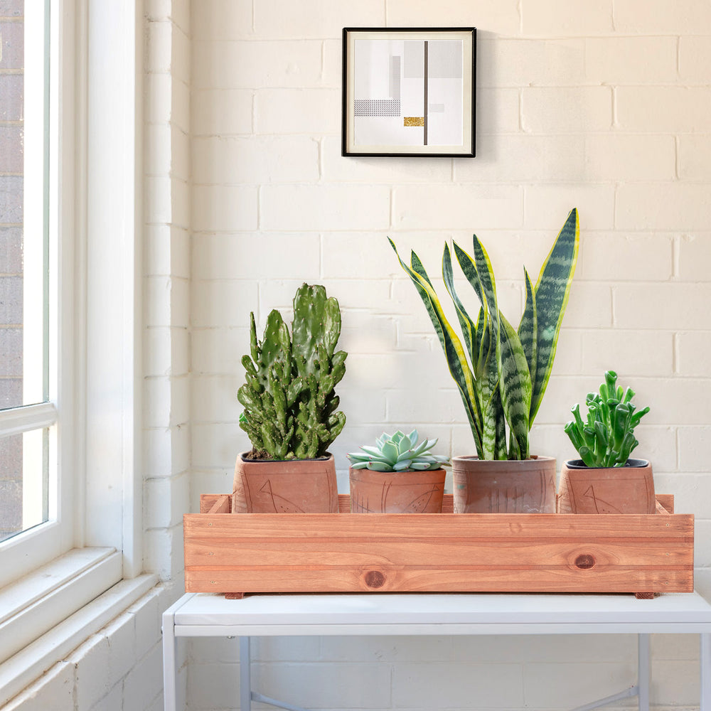 Wooden decorative raised garden bed with four potted plants, ideal for indoor or outdoor use, enhancing window beauty.