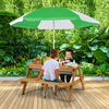 Kids enjoying playtime at a 3-in-1 outdoor picnic table with a green umbrella, perfect for water and sand activities.