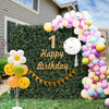 Artificial peanut leaf hedge panel with 4-layer leaves, ideal for vibrant outdoor decorations and events.