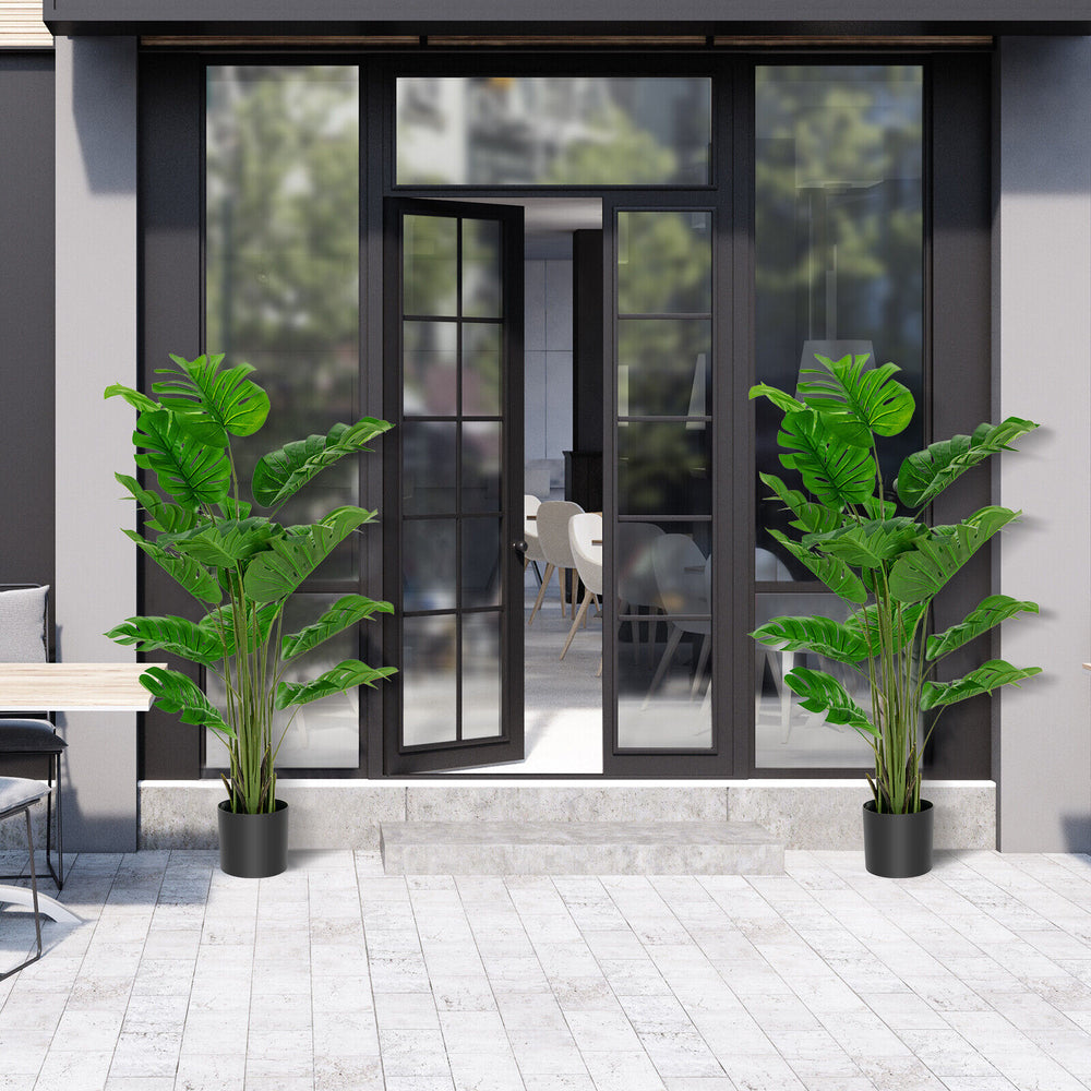 Two 5-foot artificial monstera trees with 15 large leaves each, perfect for indoor or outdoor decoration.