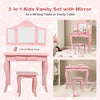 Kids pink vanity table set with tri-folding mirror and stool, perfect for makeup or as a writing table in a child's.