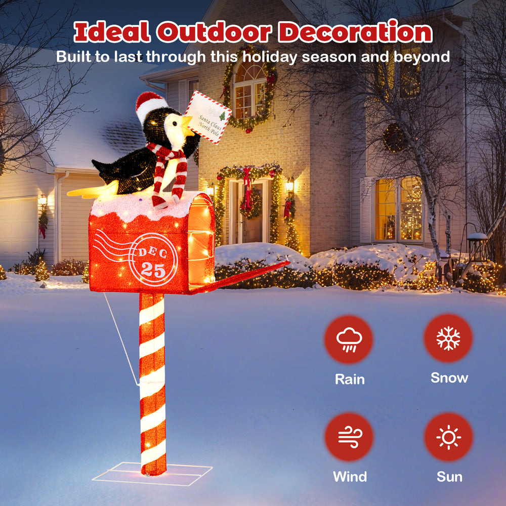 Lighted penguin on mailbox decoration with 100 warm white LEDs, weather-resistant for festive outdoor display.