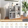 Multifunctional 4-cube bookcase in white with back guardrail, ideal for books, records, and decorative storage.