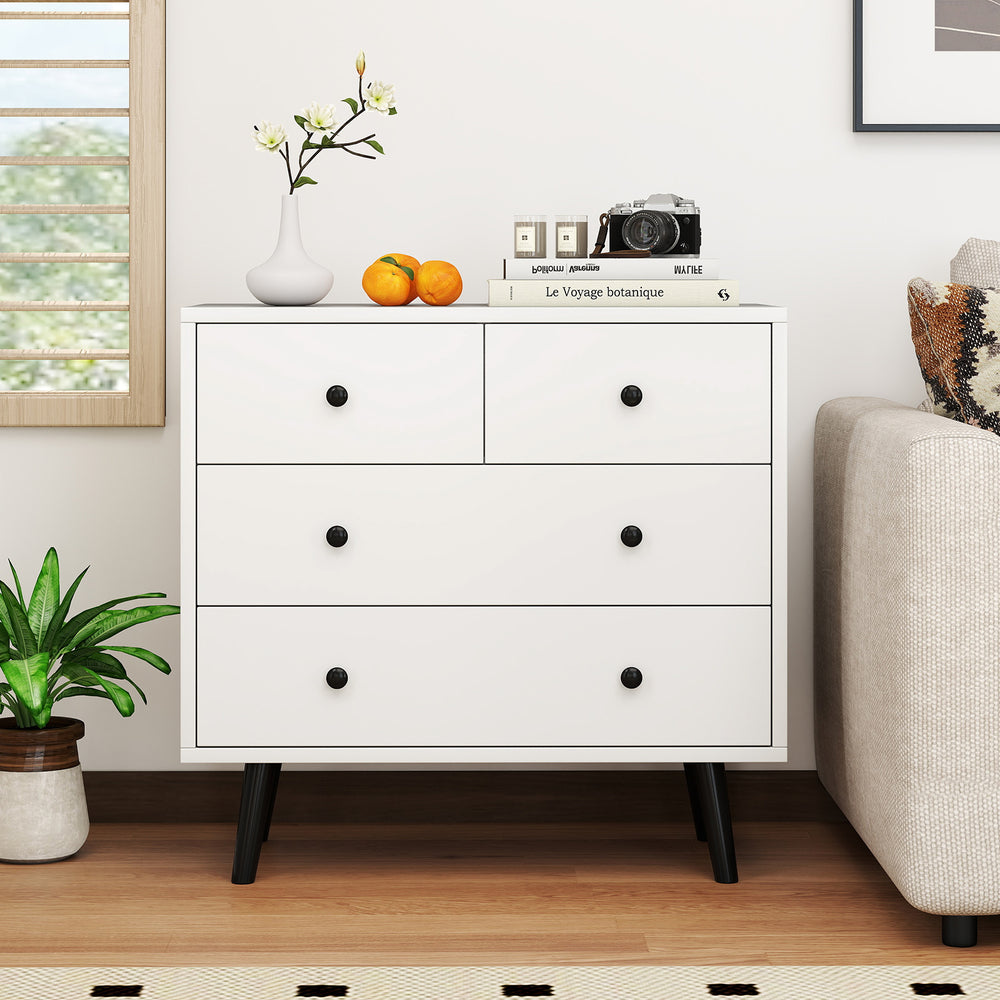 White 4-drawer dresser chest with a sleek top surface, perfect for displaying decor while providing ample storage space.