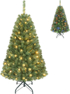 Close-up view of the 4 FT artificial Christmas tree showcasing lush PVC branches and warm white LED lights for festive decor.