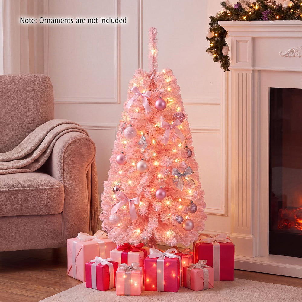 Charming 4 FT pink artificial Christmas tree with 50 warm white LED lights, perfect for creating a whimsical holiday atmosphere.