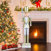 4 FT Christmas nutcracker with a white and golden finish, featuring a scepter, ideal for festive indoor or outdoor.
