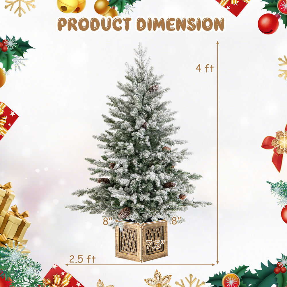 4 ft pre-lit artificial Christmas tree with 100 LED lights, snow flocked branches, and retro flower pot for festive.