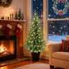 4 FT pre-lit Christmas tree with 70 warm white LED lights, decorated with red berries, ideal for cozy holiday decor.