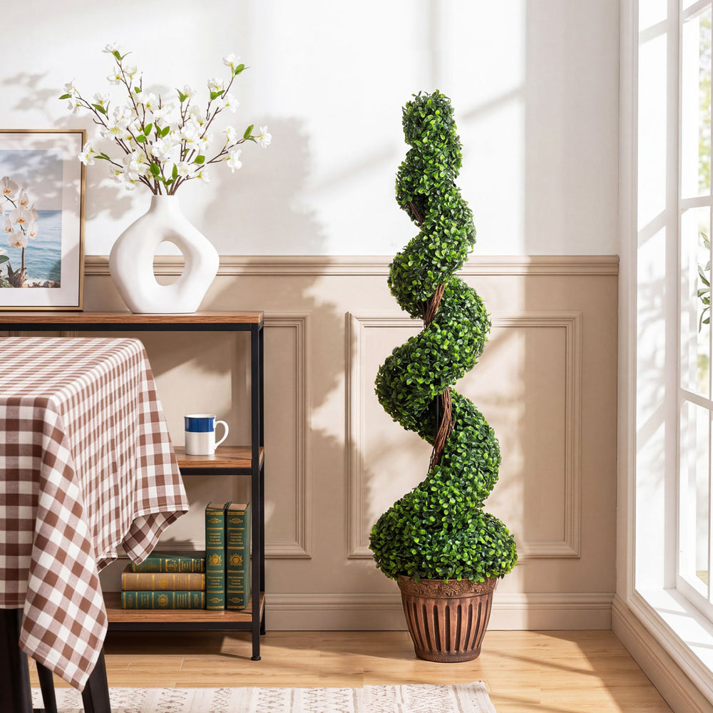 Elegant 4 feet artificial boxwood spiral tree with twisted wood vines in a sturdy planter, ideal for enhancing indoor spaces.