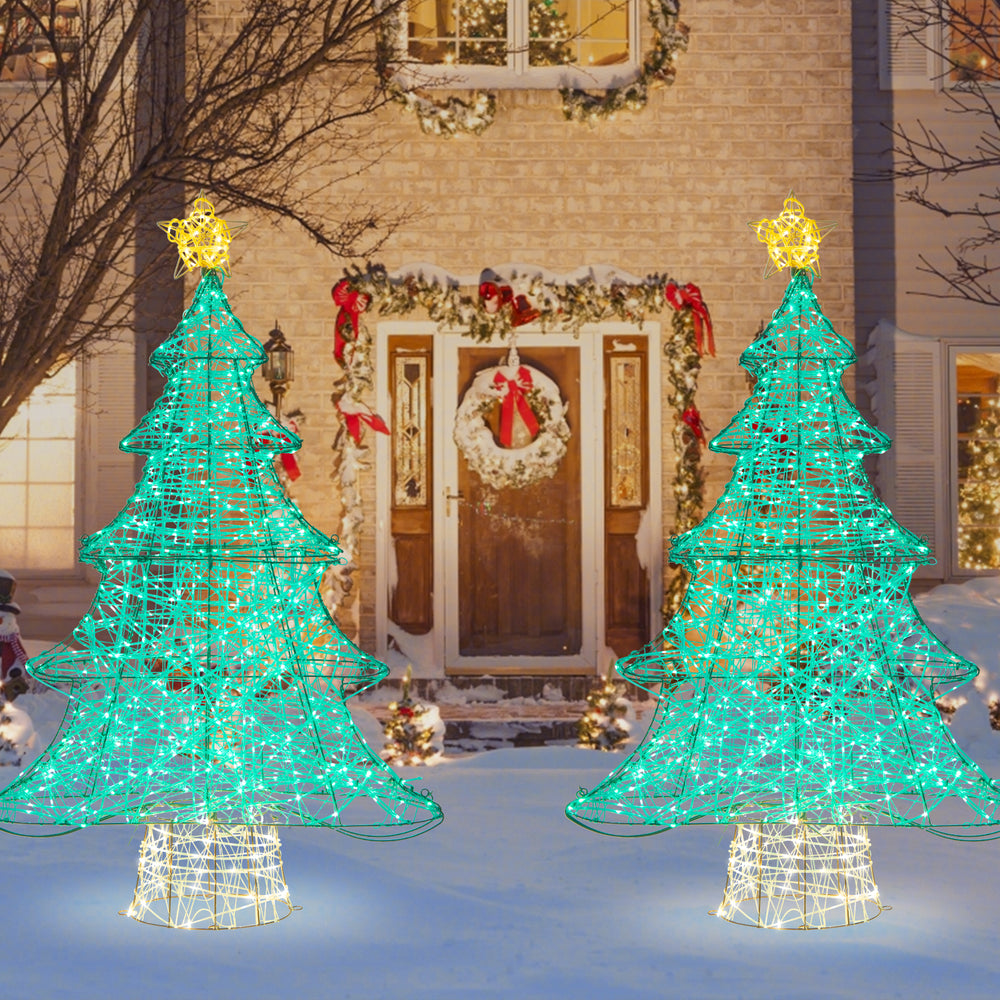 Lighted 4-foot artificial Christmas tree with 520 LED lights and top star, perfect for outdoor holiday decoration.