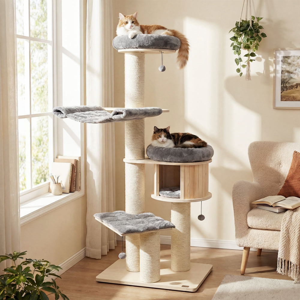 Multi-layer 68.5-inch cat tree with plush coverings, sisal posts, and cozy condo for indoor cat play and relaxation.