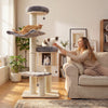 Multi-layer 68.5-inch wooden cat tree with plush coverings and sisal posts, perfect for indoor cat play and relaxation.