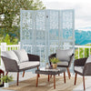 Four-panel wooden room divider with carved cutout pattern, perfect for flexible placement in any room.