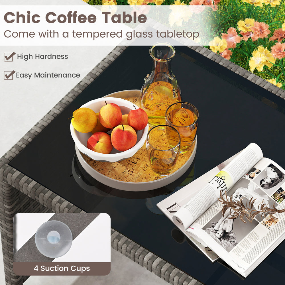 Chic coffee table with tempered glass top and rattan design, perfect for outdoor patio relaxation.