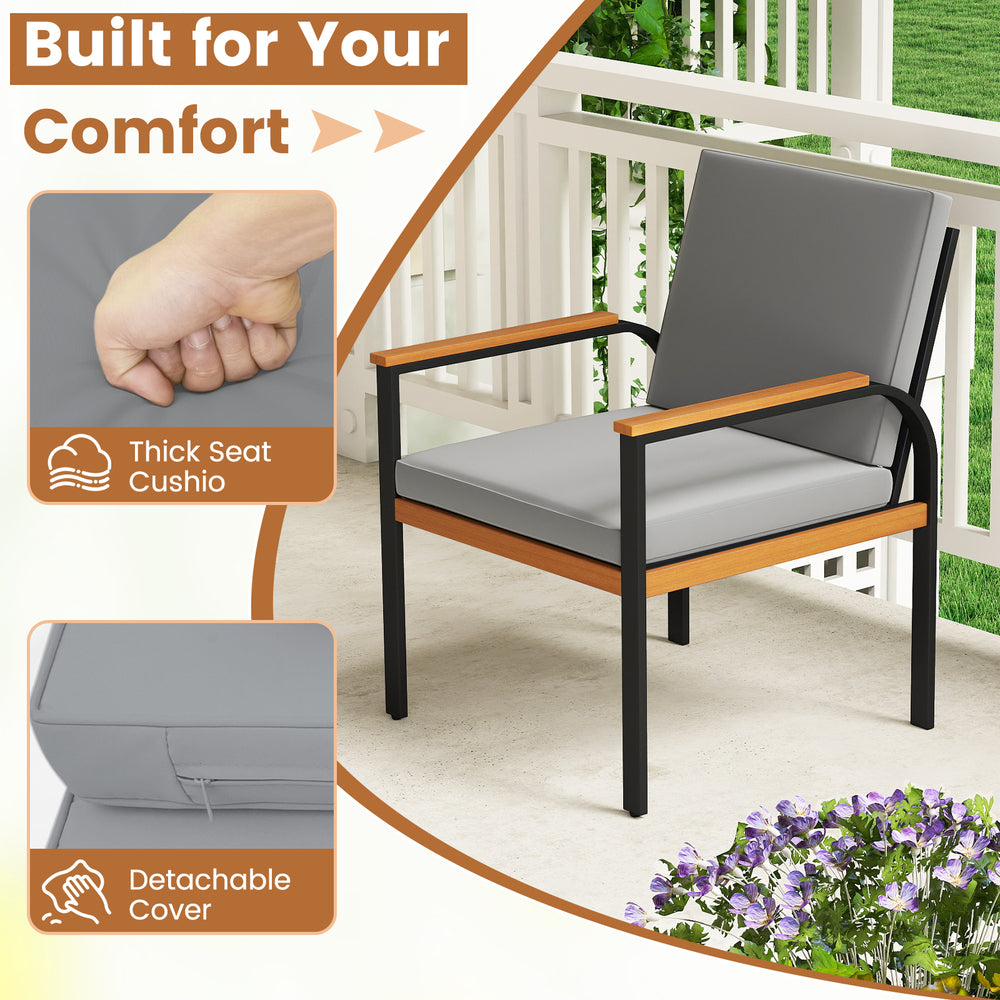 Gray patio chair with solid wood armrests, thick removable cushions, and a sturdy metal frame for outdoor comfort.