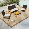 4-piece patio furniture set featuring PE rattan chairs and acacia wood coffee table, ideal for outdoor relaxation.