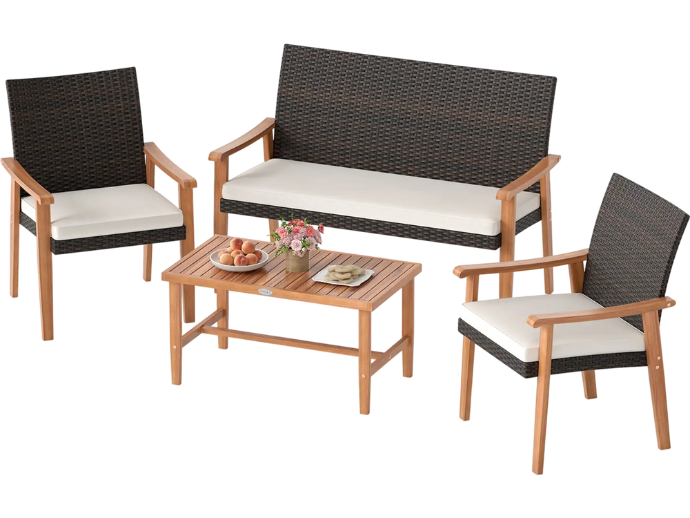 4-piece patio furniture set featuring a loveseat, two chairs, and acacia wood coffee table with soft white cushions.