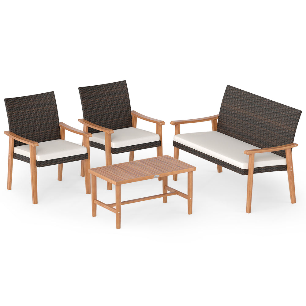 4-piece patio furniture set featuring PE rattan chairs and acacia wood coffee table with soft white cushions for.