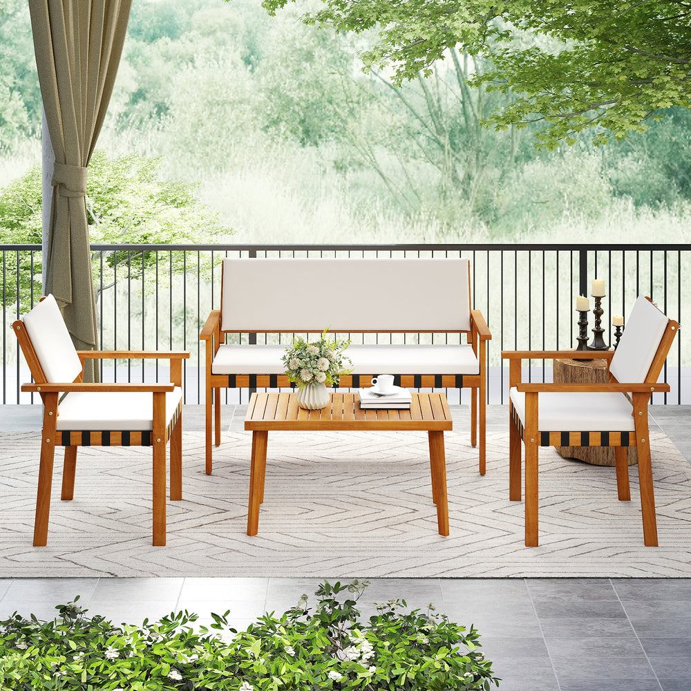 4-piece patio furniture set featuring solid acacia wood, soft white cushions, and a coffee table for backyard.