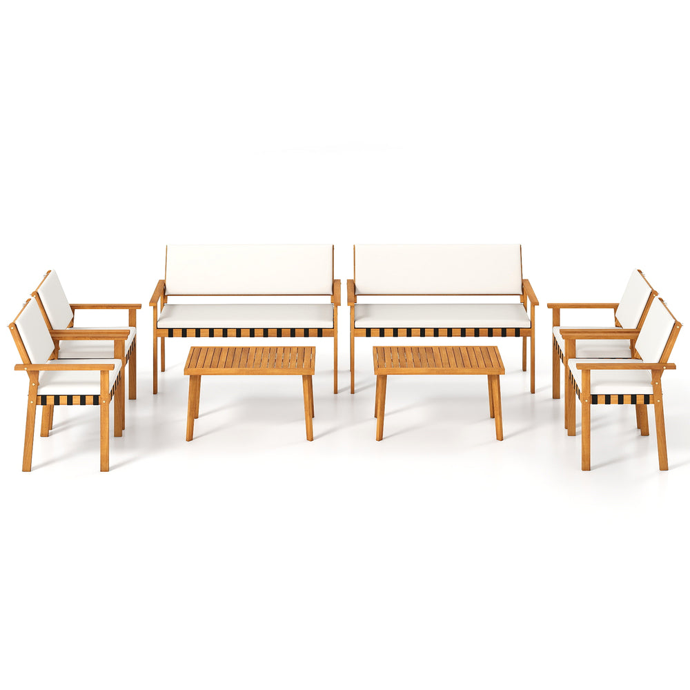 4-piece patio furniture set featuring solid acacia wood, soft cushions, and a coffee table, ideal for backyard.