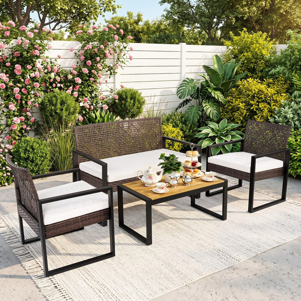 Stylish wicker chair with a removable cushion, designed for comfort and perfect for outdoor patio settings.