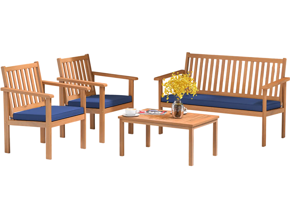 Acacia wood armchairs with navy cushions, designed for outdoor comfort and style in backyard or porch settings.