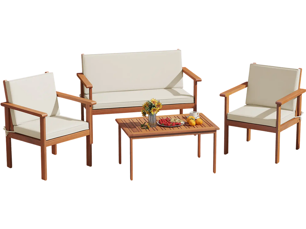 4-piece patio furniture set featuring acacia wood chairs and table with white cushions, perfect for poolside relaxation.