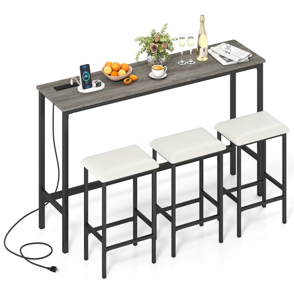 Counter height bar table with power outlet and three padded stools, featuring a rustic gray wood-like surface for.