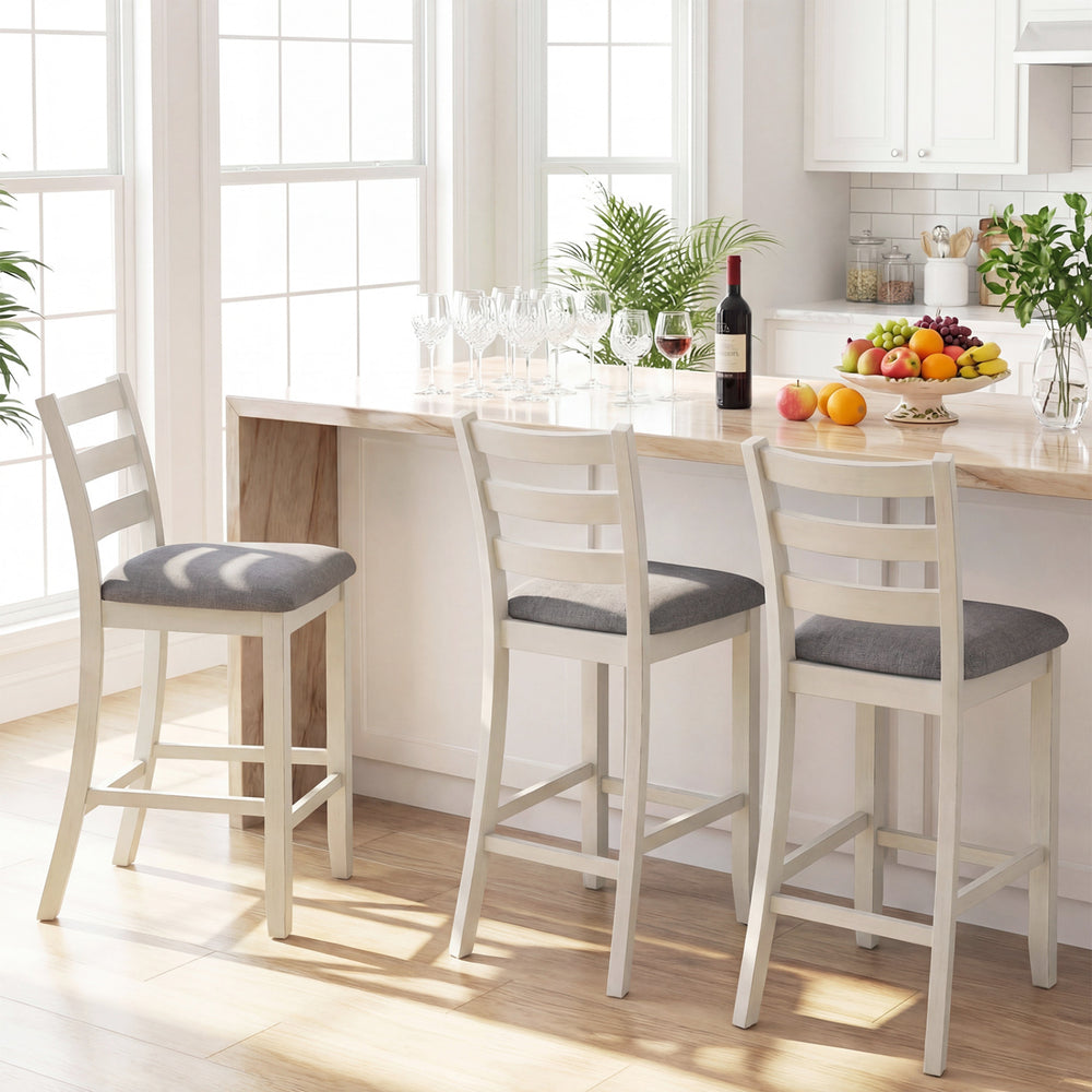 Counter height chair with beige fabric seat and rubber wood legs, ideal for family meals and gatherings.