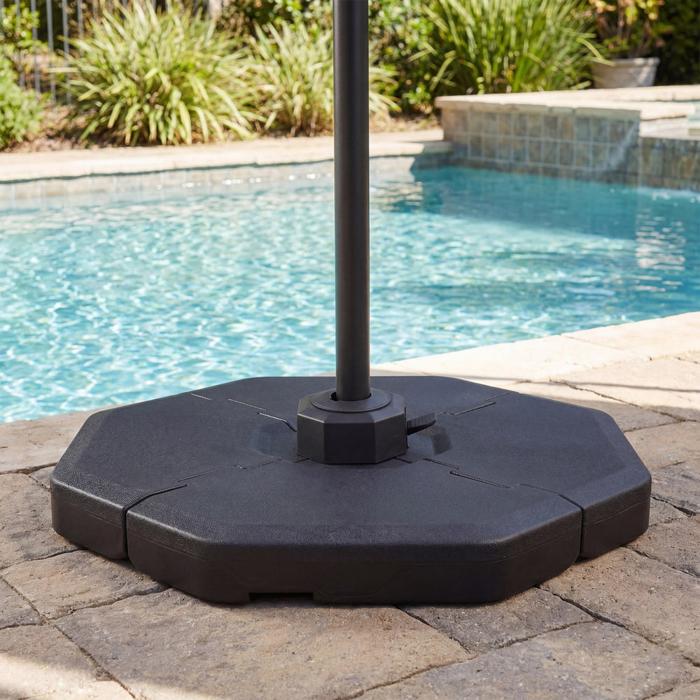 Octagonal patio umbrella base plate set made of weather-resistant PE material, ideal for poolside stability and support.