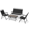Folding patio furniture set with black chairs and SPC coffee table, ideal for garden and backyard relaxation.
