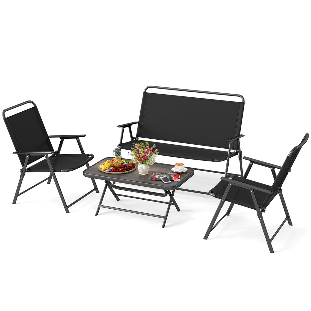 Folding patio furniture set with black chairs and SPC coffee table, perfect for garden or backyard relaxation.