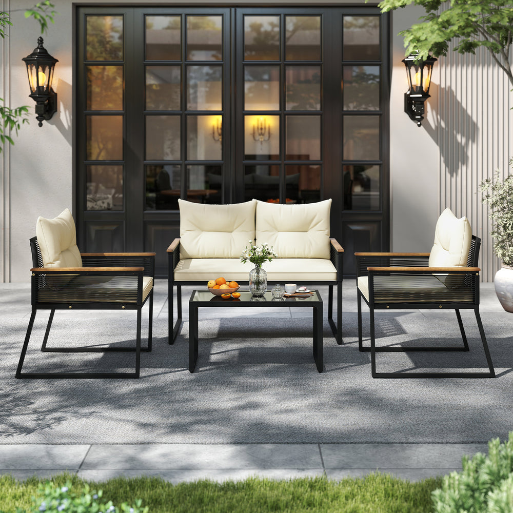 4-piece patio furniture set featuring a black tempered glass coffee table and cream cushions, perfect for outdoor.